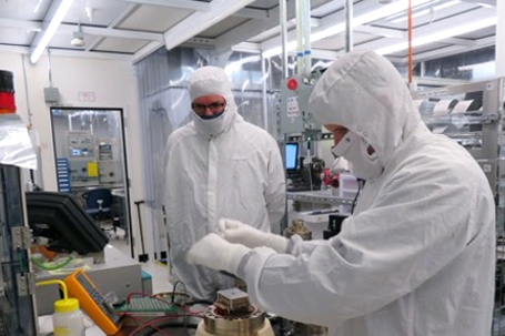 Researchers in clean room lab
